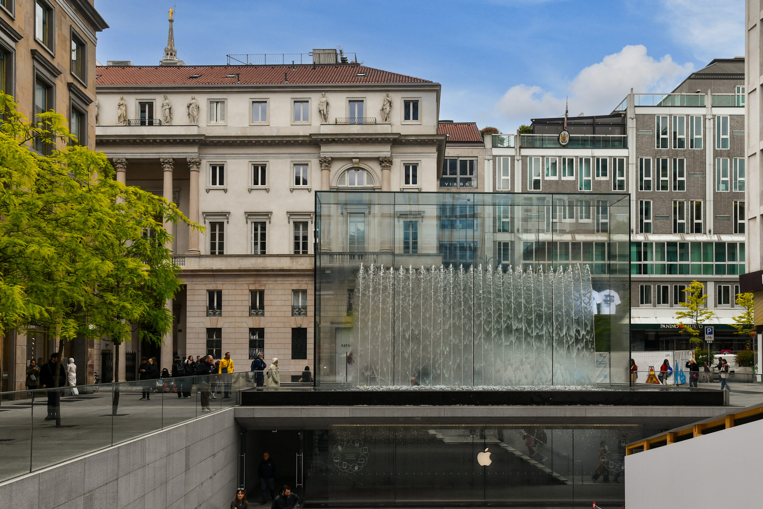 Exterior of the Apple flagship store, with the spectacular crystal fountain and the underground entrance, in the central Piazza Liberty, Milan, Lombardy, Italy